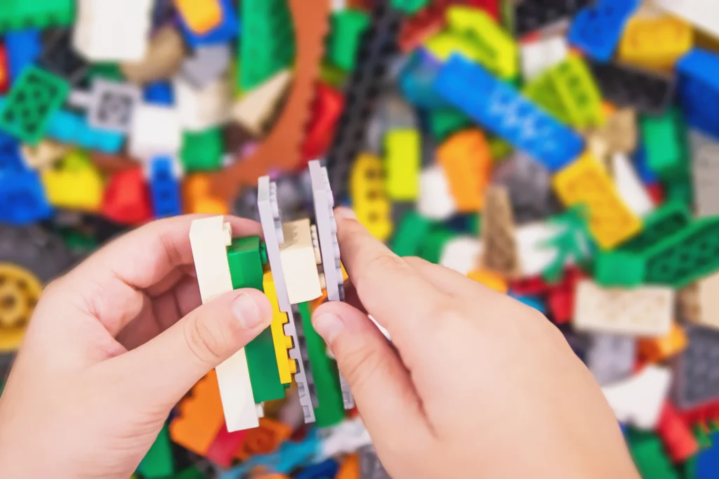 boy playing Lego